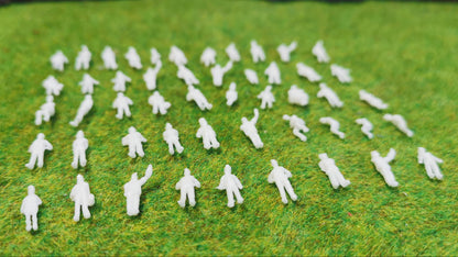 50x Reisende Figuren 1:160 (Spur N) sitzend & stehend, unbemalt