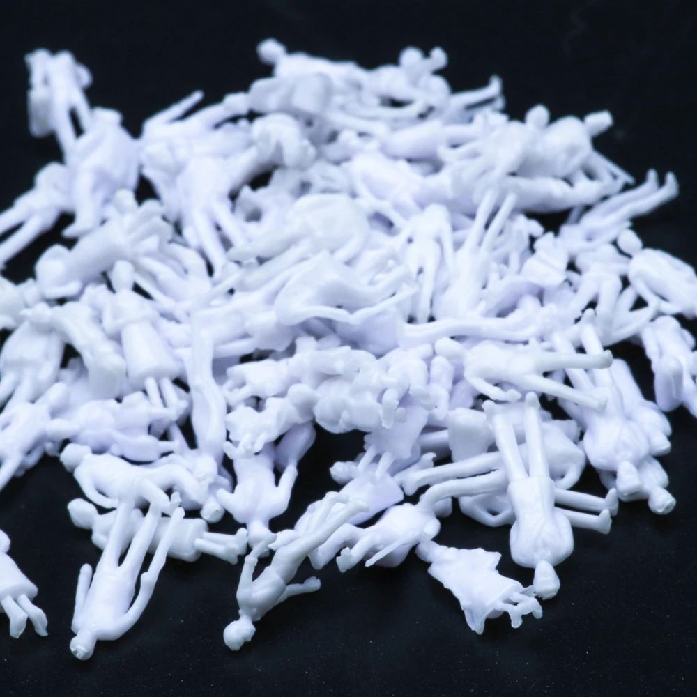 100x Figuren stehende & sitzende Reisende für Spur Z (1:200) - unbemalt