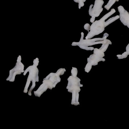 100x Figuren stehende & sitzende Reisende für Spur Z (1:200) - unbemalt