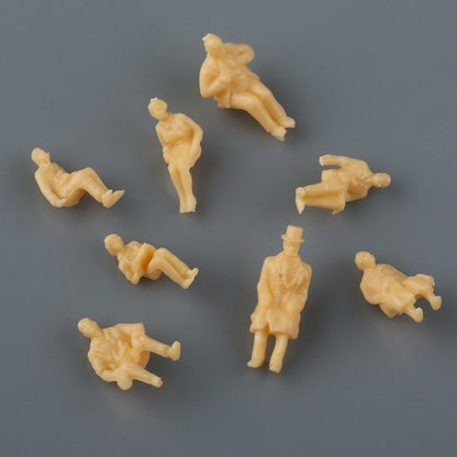 50x Figuren sitzende Reisende für Waggons für H0 (1:87) - unbemalt