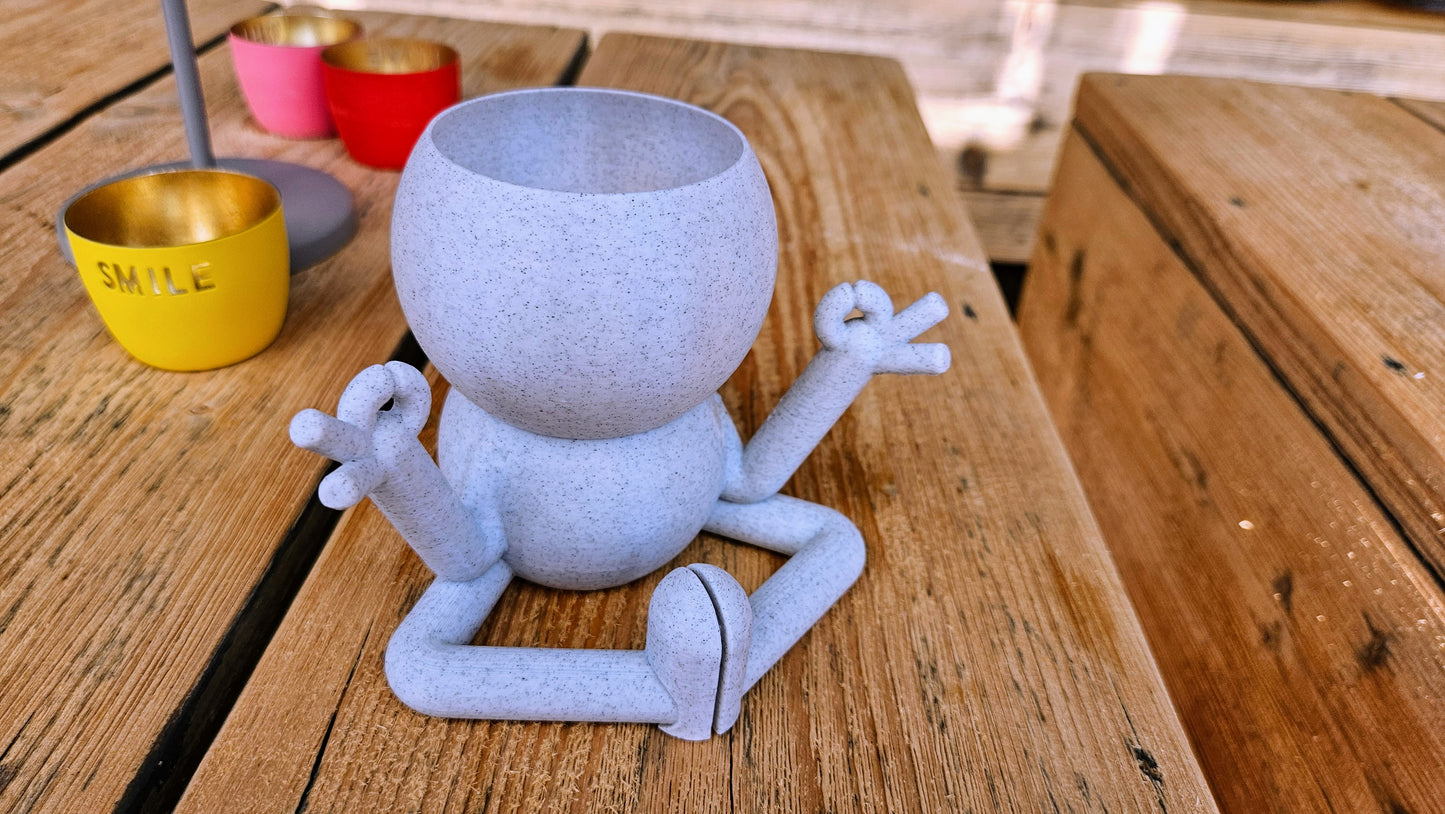 Harry Plant "Meditation" lustiger Blumentopf zeigt Entspannungsübung